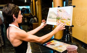 Artist Hadley Rampton offers a painting demonstration at the High Desert Museum.